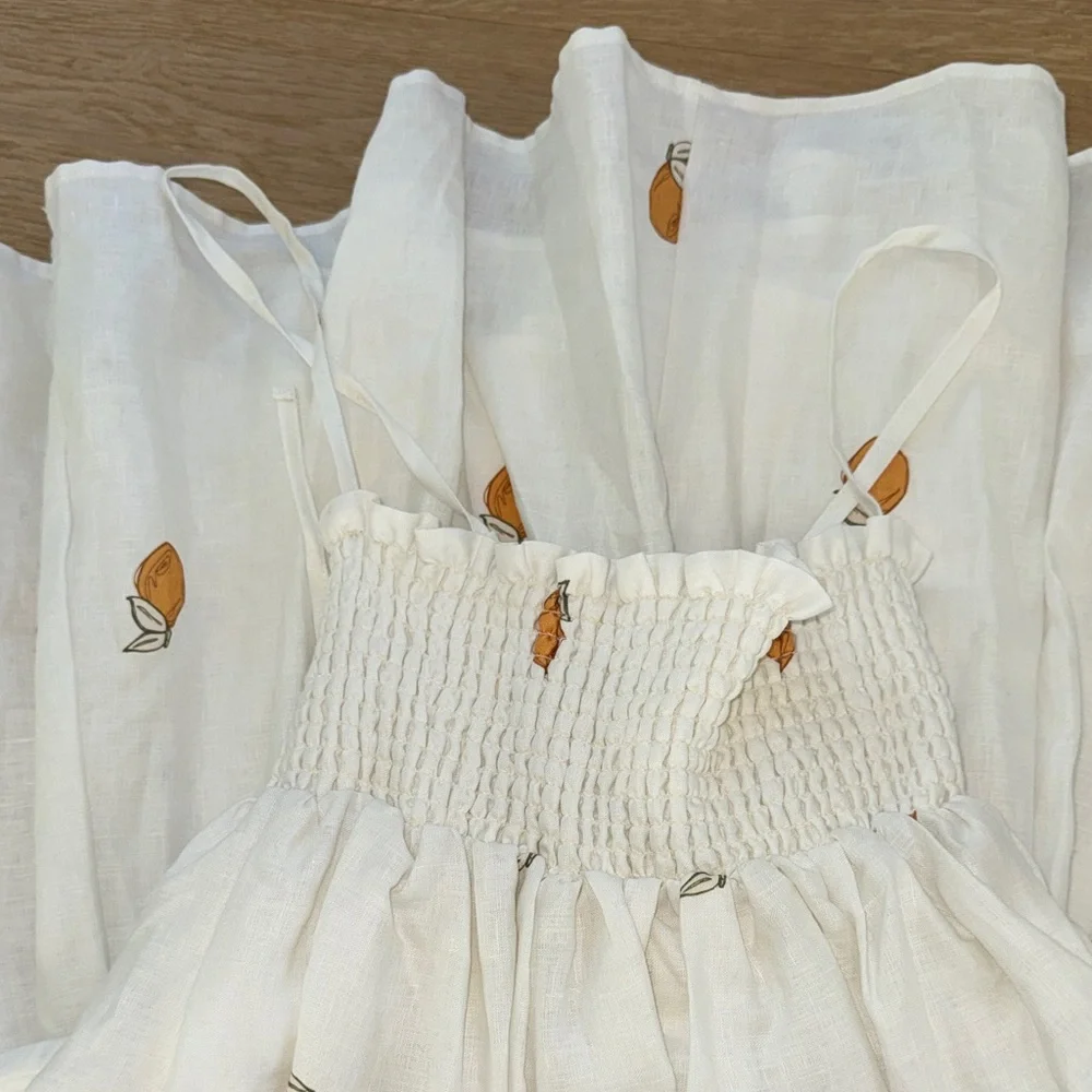 White Smocked Sundress with Orange Fruit Print - Picture 5 of 7